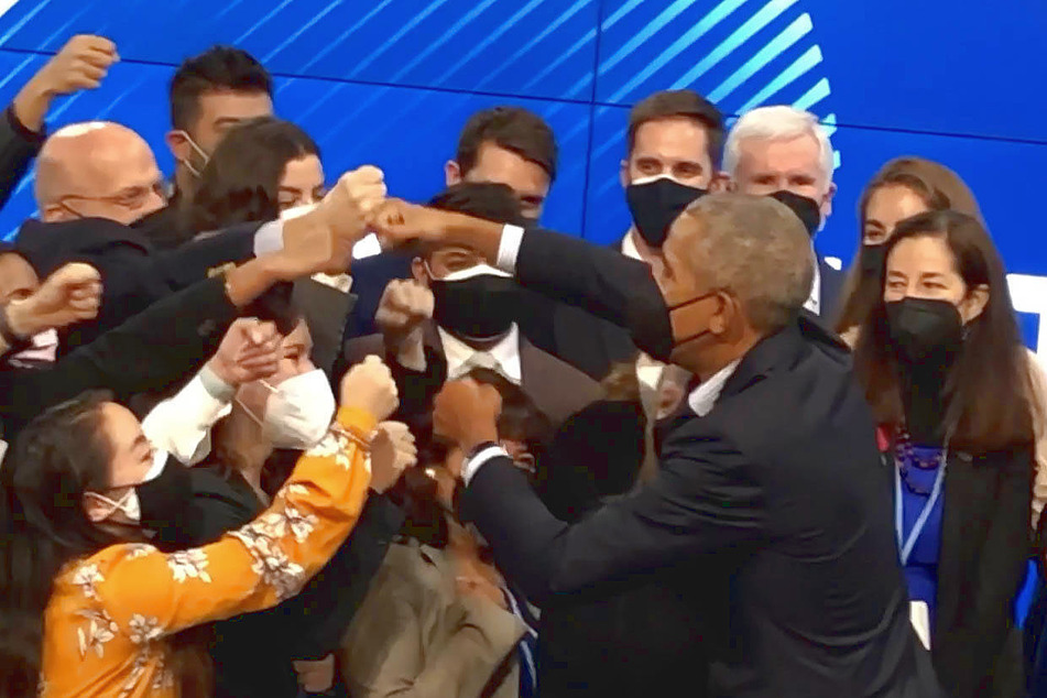 Fist bumps all around from former President Obama, a fan-favorite at the conference.