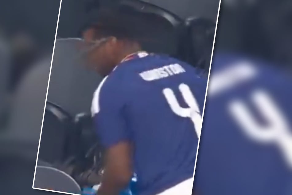 Ein Video auf dem NFL-Kanal von Instagram zeigt den Quarterback der New York Giants, Jameis Winston (32), zwischen den japanischen Fans beim Saubermachen im Stadion.
