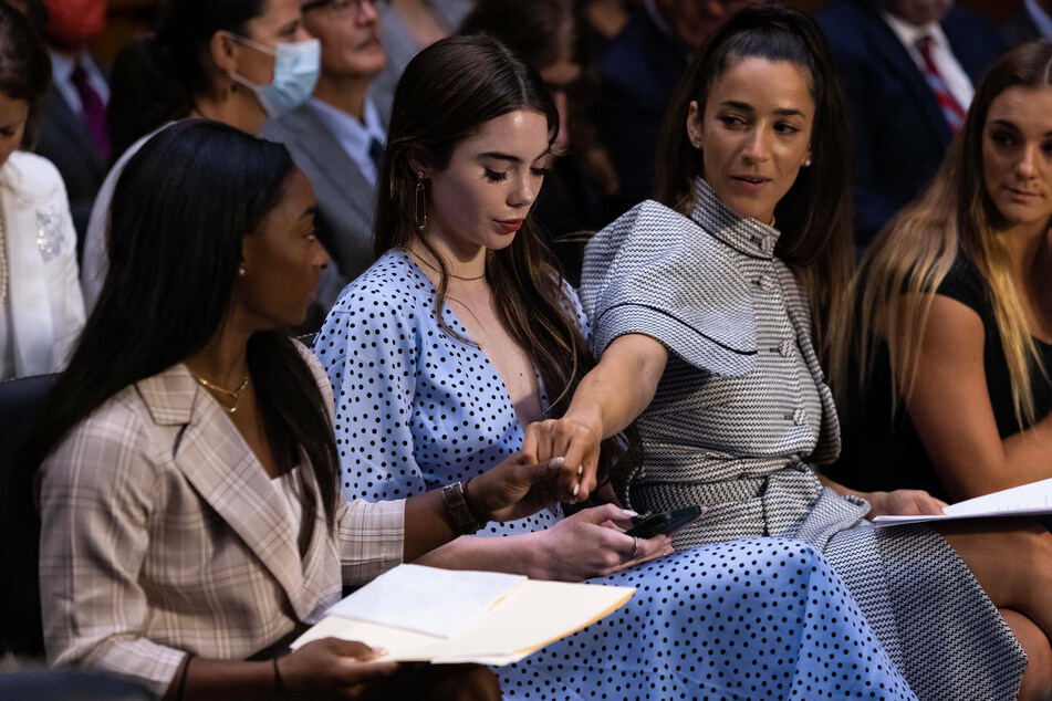 Biles gave her testimony alongside fellow survivors McKayla Maroney, Aly Raisman, and Maggie Nichols (from l. to r.).