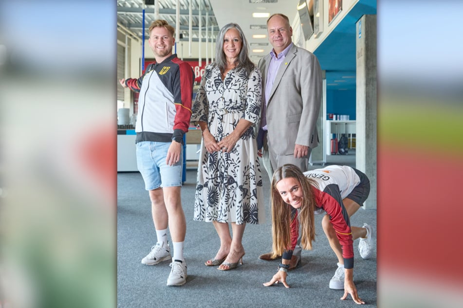 Robert Grabowski (33) und Läuferin Bera Wierhake (23, mit Spenderleber) freuen sich auf die Transplantierten-WM. Mittig: Liz Schick (62), Präsidentin der World Transplant Games Federation, und OB Dirk Hilbert (52, FDP).