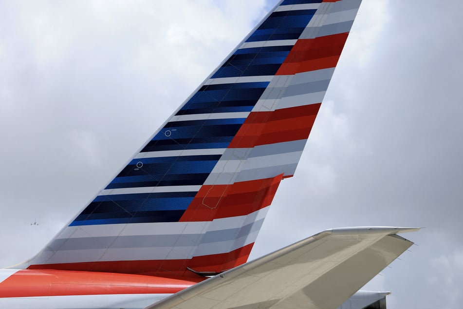 One passenger on board the evacuated American Airlines flight sustained a minor injury and was taken to a hospital for evaluation.