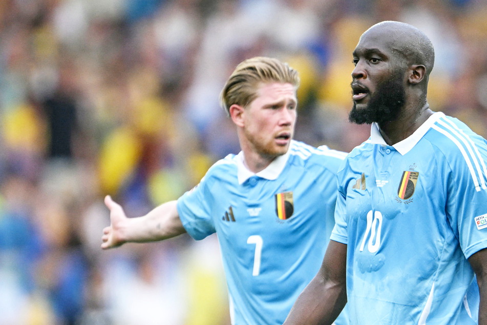 Kevin de Bruyne (l.) und Romelu Lukaku stehen mit Belgien im Achtelfinale und treffen nun auf Frankreich.