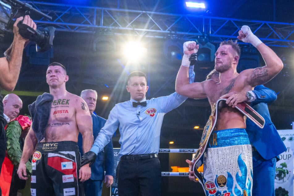 Herausforderer Artur Reis (33, r.) wurde etwas überraschend zum Sieger gekrönt.