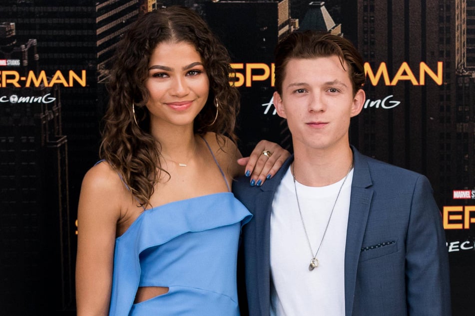 Zendaya and Tom Holland (r.) first crossed paths while co-starring in 2017's Spider-Man: Homecoming.