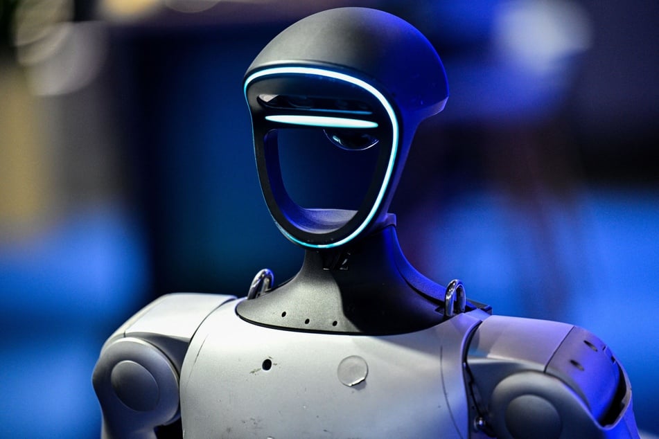 A robot controlled by a remote control is seen during the Mobile World Congress at the Shanghai New International Expo Center on June 18, 2025.