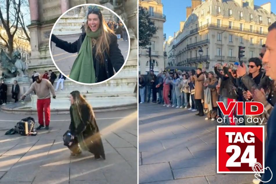 Today's Viral Video of the Day shows a brave girl dancing in the middle of a busy city street with a lone busker.
