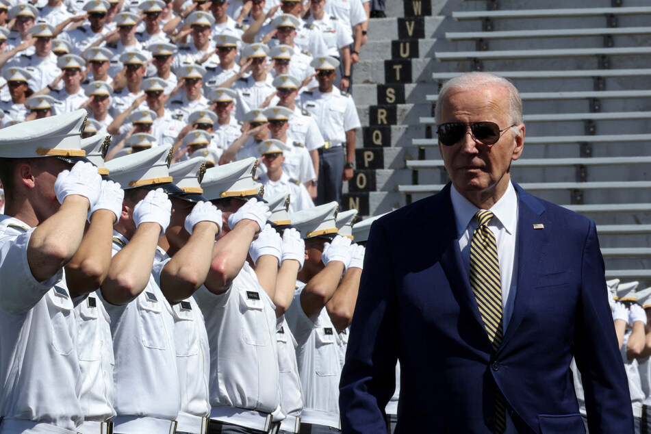 President Joe Biden is saluted by West Point graduates as he arrives to deliver the commencement address.
