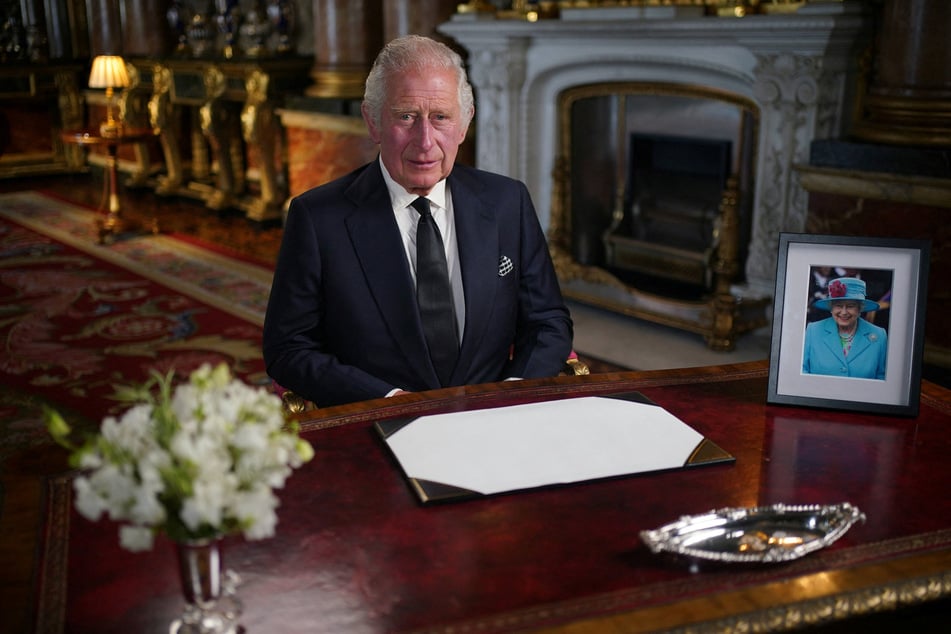 King Charles III delivering his first address to the British nation as monarch.