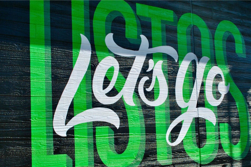 A wall outside Q2 Stadium, Austin FC's home field, is painted with the word "Listos" – meaning "let's go" – one of the many things fans chant during games.