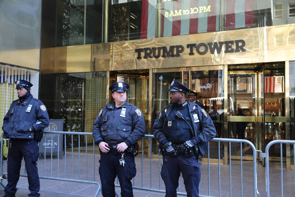 NYPD officers outside of Trump Tower in New York City on Tuesday, the day Donald Trump predicted he would be arrested.