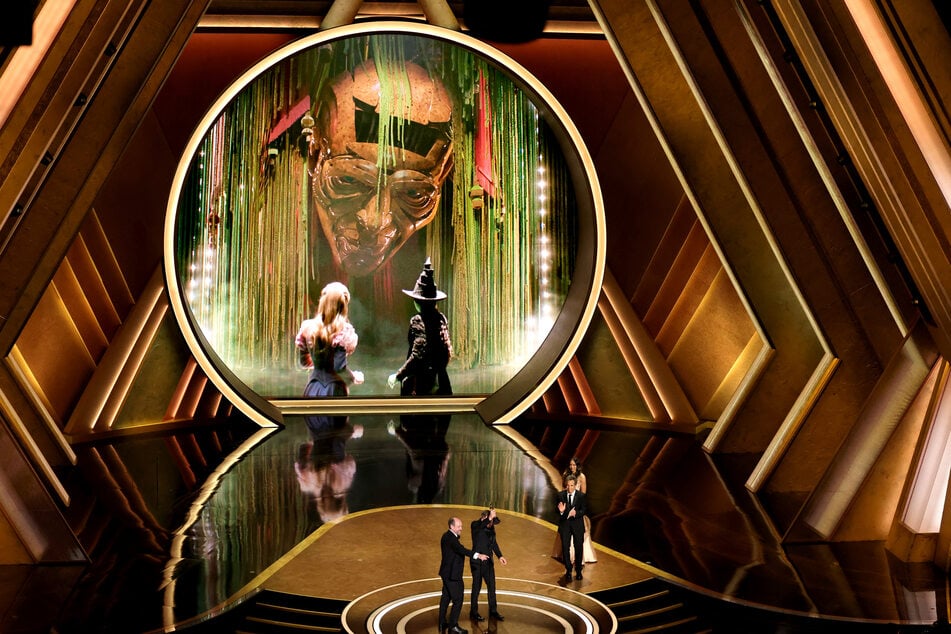 (L-R) Nathan Crowley and Lee Sandales accept the Production Design award for Wicked onstage during the 97th Annual Oscars at Dolby Theatre on March 02, 2025 in Hollywood, California.