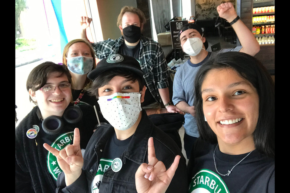 Starbucks workers in Seattle celebrate their union wins on Friday.