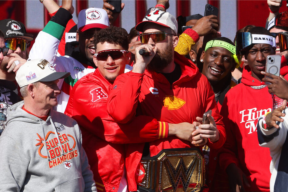 Travis Kelce (c.) joined his Kansas City teammates to celebrate their Super Bowl win at Wednesday's parade.