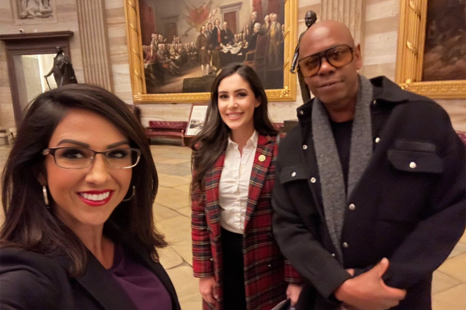 Congresswoman Lauren Boebert (l.) shared a photo and social media post that included a photo of her with comedian Dave Chappelle (r.) and Rep. Anna Paulina Luna.
