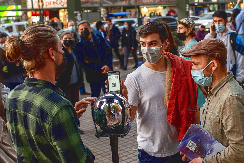 The Orb with its operator help interested users get their eyes scanned. The Orb also take photos and records video and does "three-dimensional mapping of users' body and face."