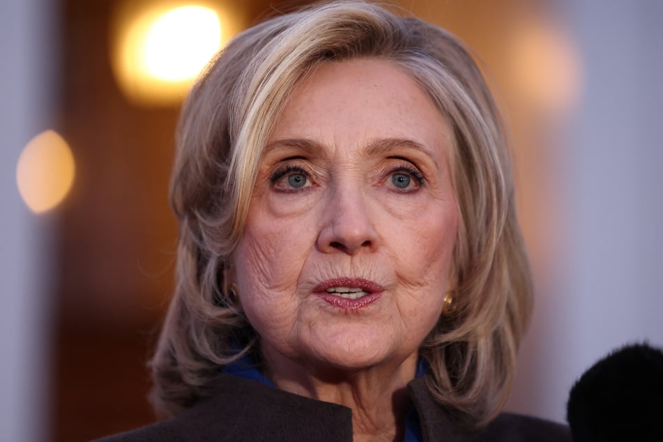 Hillary Clinton's hearing was briefly halted after an image of her in the deposition was leaked online.