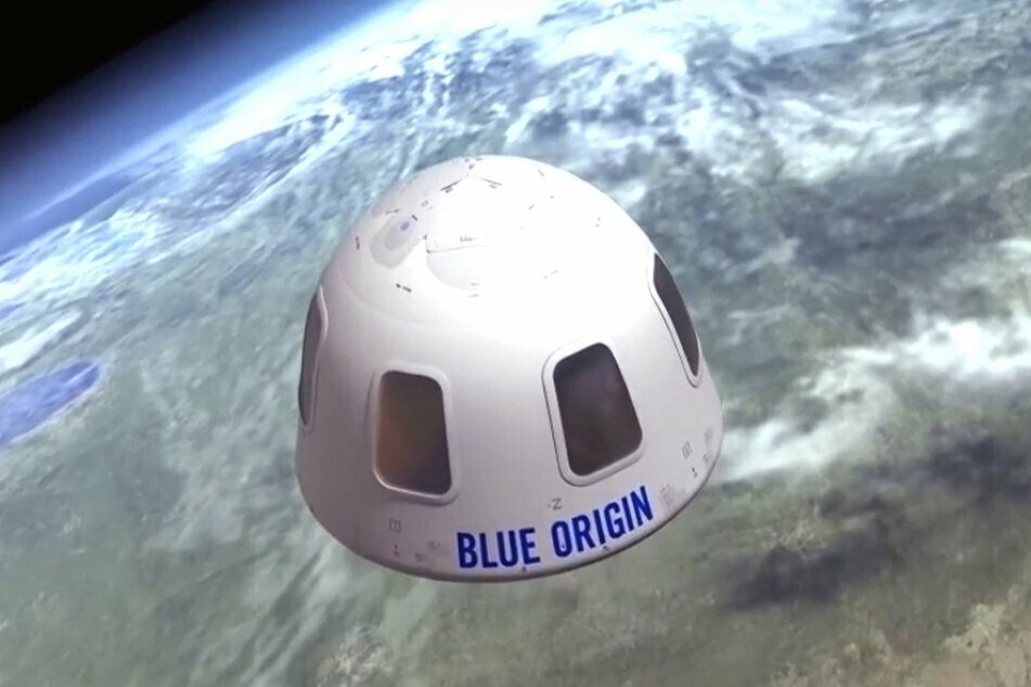 Diese Illustration zeigt die Kapsel, mit der die Firma Blue Origin Touristen ins All bringen will.