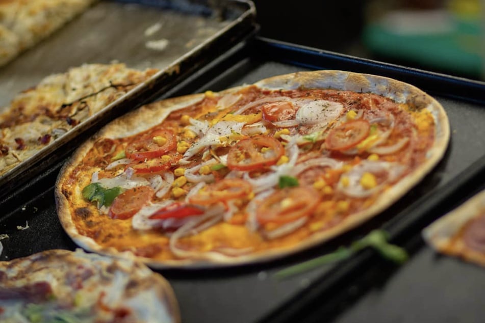 Delicious tarte flambée, pizza and Far Eastern dishes are available at the street food festival at the Old Fair.