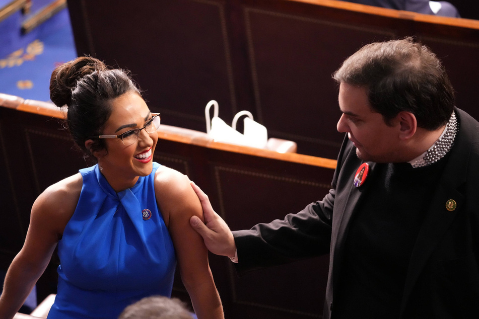 Representative Lauren Boebert (l.) speaking to former Rep. George Santos before the State of the Union address to Congress in Washington DC on March 7, 2024.
