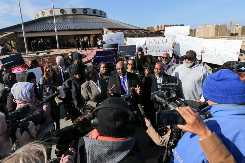 Black Creek Freedmen gather outside the Muskogee Nation District Court in Okmulgee seeking restoration of citizenship rights suddenly stripped from them in 1979.