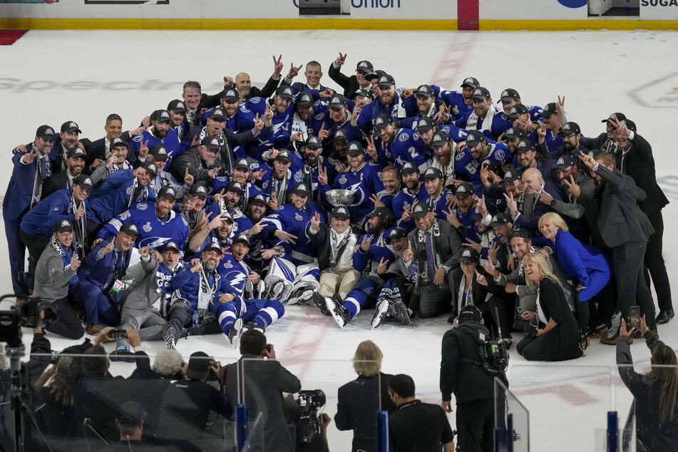 The Lightning celebrating a historic second-straight Stanley Cup on the ice.