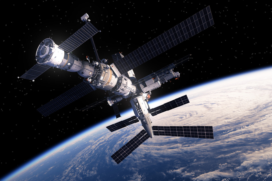 The International Space Station and research facility orbits the Earth (stock image).
