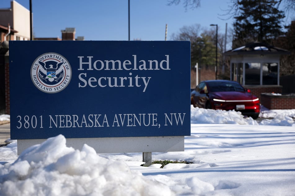The sign of Department of Homeland Security is seen outside its headquarters on Friday in Washington, DC.
