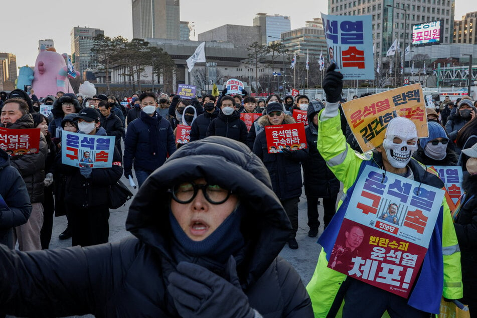 Protesters demonstrate against the impeached South Korean President Yoon Suk Yeol near Gwanghwamun in Seoul on January 11, 2025.