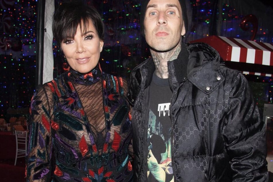 Kris Jenner poses with her soon-to-be son-in-law, Travis Barker.