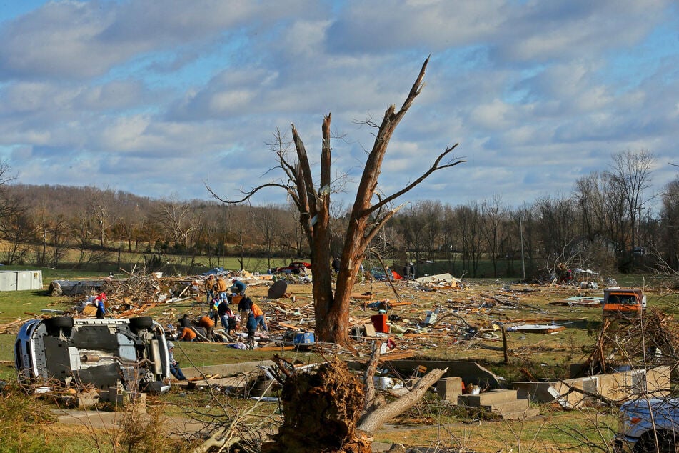 Families searched amidst remnants of a home in Missouri that was heavily damaged by the tornados that hit on Friday night.