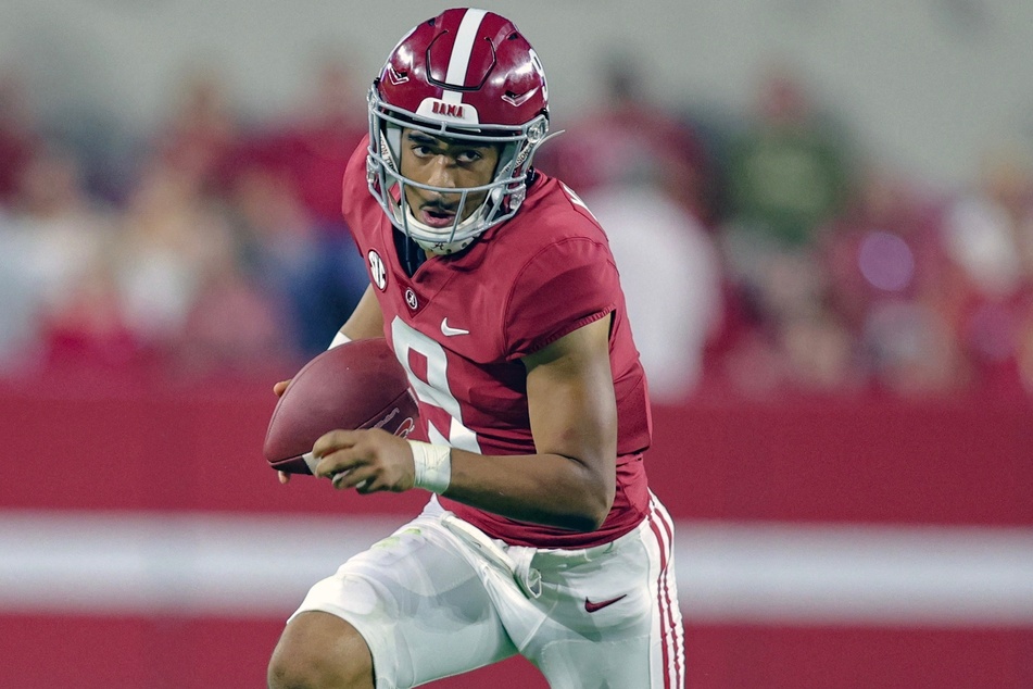 Alabama's Bryce Young leads the Crimson Tide as its leading rusher, completing 18 of 28 passes for 195 passing yards and five touchdowns in the season opener against Utah State.