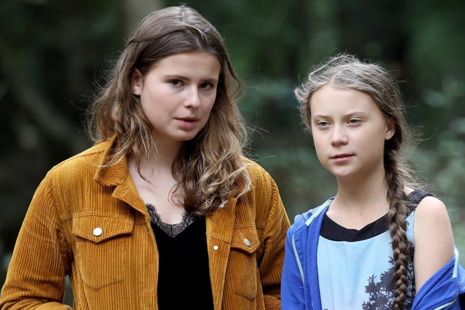 Luisa Neubauer (l.) und Greta Thunberg zusammen im Hambacher Forst (NRW) im August 2019.