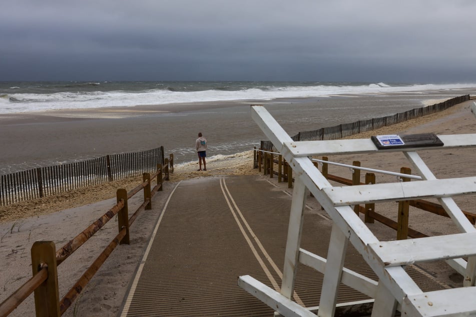 Hurricane Erin, now Category 2, has brought significant flooding and dangerous surf conditions to the East Coast.