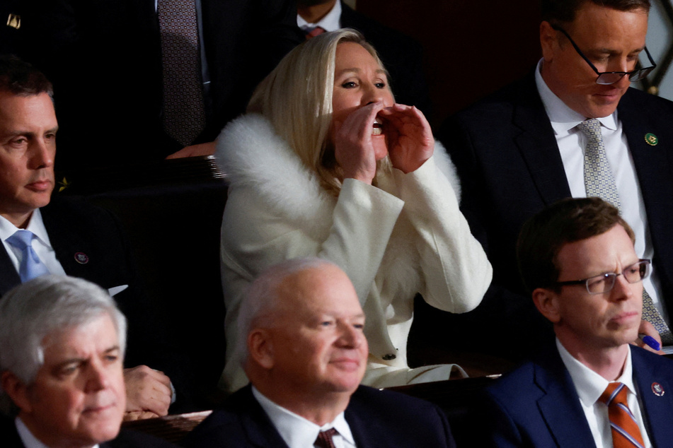 Georgia Rep. Marjorie Taylor Greene yells at President Joe Biden as he delivers his State of the Union address.