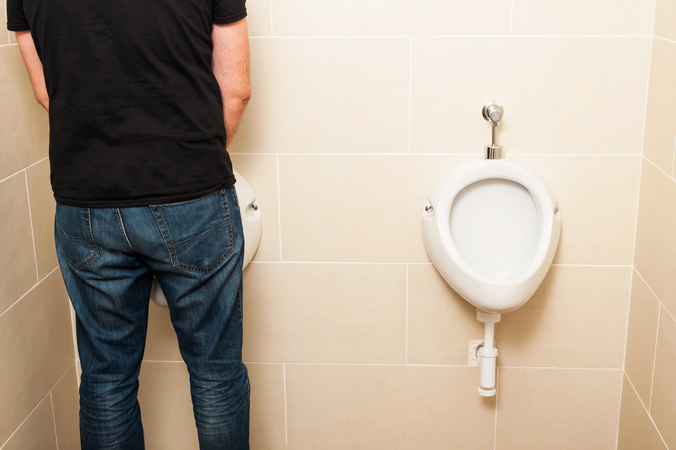 A man urinating (stock image).