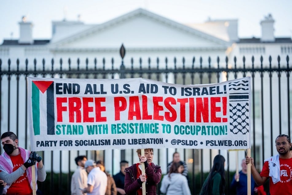 Protestors rally outside the White House against US support for Israel's renewed bombing of Gaza.