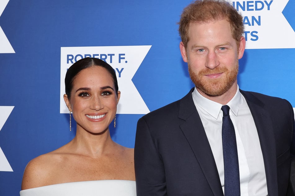 Prince Harry (r.) and Meghan Markle (l.) will continue to develop film and TV projects for Netflix but on more limited terms, the streaming giant announced Monday.
